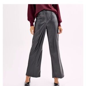 Black pleated faux leather trousers size 14 wide leg 
Beautifully made